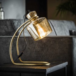 Lampe de table en verre ambré sur un pied arrondi en métal de style vintage