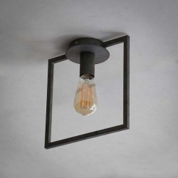 Plafonnier une ampoule incrustée dans un cadre en métal style industriel